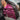 Open lining view of women's purple leather motorcycle vest, with additional view from another angle