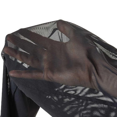 Lifestyle view of armored mesh tactical pants, with additional view from another angle