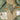 Close-up of camouflage mesh lining and interior labels inside the Cockpit USA M-86 Flight Bomber Jacket.