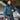 Cockpit USA Men's B-15 bomber jacket modeled next to aircraft, premium product detail
