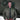 Model wearing Cockpit USA Men's MA-1 Nylon Flight Jacket in olive green in front of military aircraft