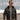 Male model wearing Cockpit USA Men's Mil Spec G-1 jacket on an airfield