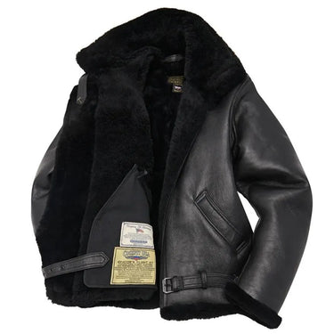 Inside view of Cockpit USA R.A.F. Sheepskin Bomber Jacket in black, showing full shearling lining and authenticity tags
