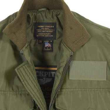 Close-up of interior label showing Cockpit USA branding and "Made in USA" on the WEP jacket