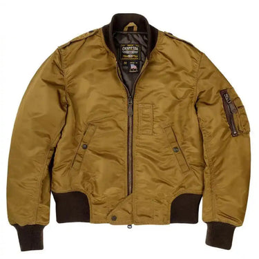 Front view of the Cockpit USA Women's The Jenny MA-1 Nylon Flight Jacket in gold with brown knit cuffs made in USA