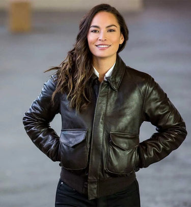 Female model wearing Cockpit USA Women’s WASP A-2 Flight Jacket with hands in pockets