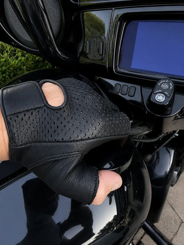 Fingerless Deerskin Gloves shown in a riding setting made in USA, a motorcycle glove