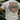 Lifestyle shot of rider wearing Legendary All American t-shirt with bold USA Legendary back graphic, riding motorcycle, made in USA