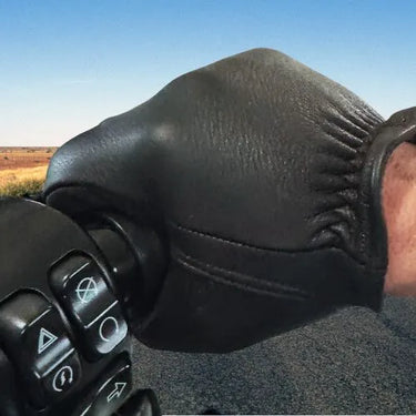 Legendary Deerskin Aramid Lined Short Wrist Touchscreen Gloves worn on motorcycle handlebars