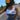 On-model view of Legendary USA white motorcycle tank top worn while riding, showing USA Legendary chest logo