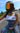 On-model view of Legendary USA white motorcycle tank top worn while riding, showing USA Legendary chest logo