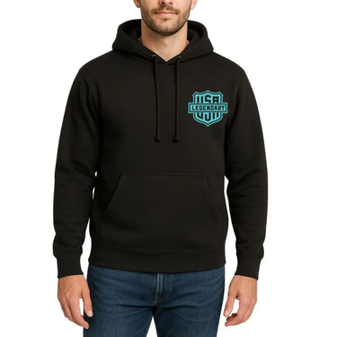 Male model wearing Legendary black hoodie with blue USA shield logo, front view