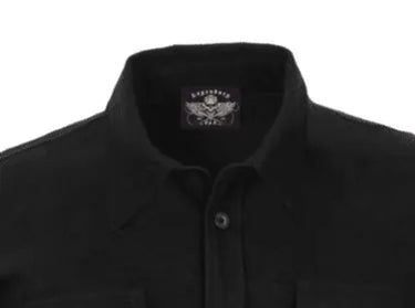 Close-up view of Legendary OG flannel riding shirt collar and label, showcasing heavyweight construction, made in USA