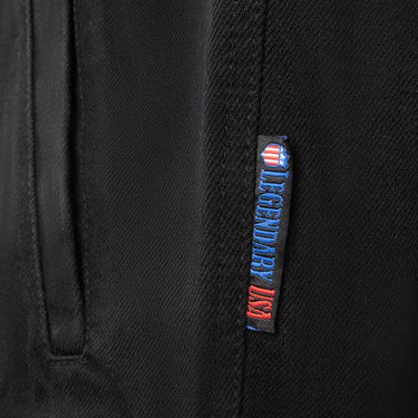 Close-up of Legendary USA Made in USA woven tag on Revolution men’s denim motorcycle vest