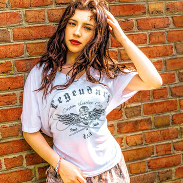 Flat-lay of the Legendary USA Women's Chill Out Biker Chick Shirt showing full design details and V-neck style, Made in USA