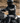Detail view of Legendary men's black leather motorcycle jacket, with hardware and stitching visible