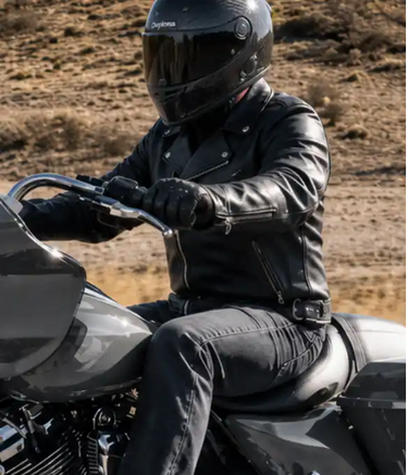 Detail view of Legendary men's black leather motorcycle jacket, with hardware and stitching visible