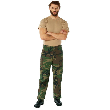 Lifestyle view of Men's Rothco rip-stop tactical pants, with additional view from another angle
