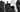 Black and white fingerless deerskin motorcycle gloves, made in USA