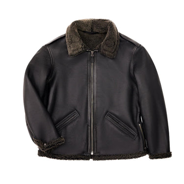 Cockpit USA Black Ops Shearling B-6 Bomber Jacket detail close-up of shearling collar and cuff trim on white background