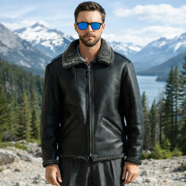 Cockpit USA Black Ops Shearling B-6 Bomber Jacket worn outdoors with mountain landscape in the background