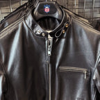 Close-up of BECK® 732 Black Horsehide Jacket collar and zipper detail on hanger