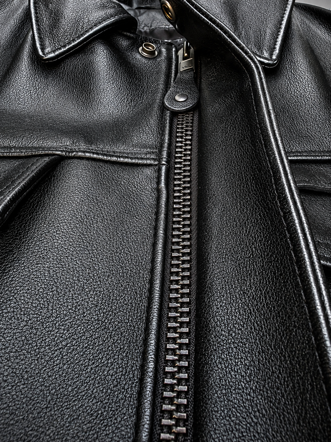 Waist-length hem — sits at the belt