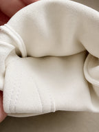 Interior lining of the Cadbury White Touchscreen Gloves showing the pockets and finish made in USA