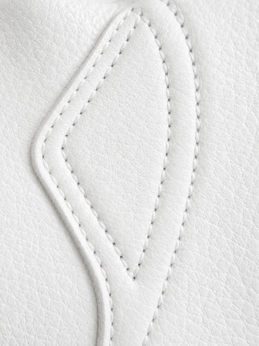 Close-up of the stitching and construction on the Cadbury White Touchscreen Gloves made in USA