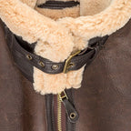 Close-up of the collar buckled of a Cockpit USA men's British RAF sheepskin bomber jacket