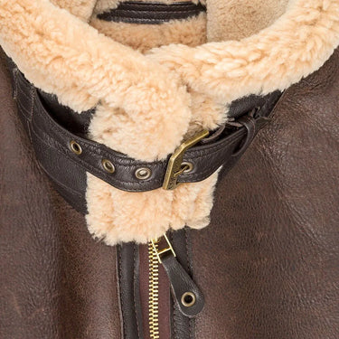 Close-up of the collar buckled of a Cockpit USA men's British RAF sheepskin bomber jacket
