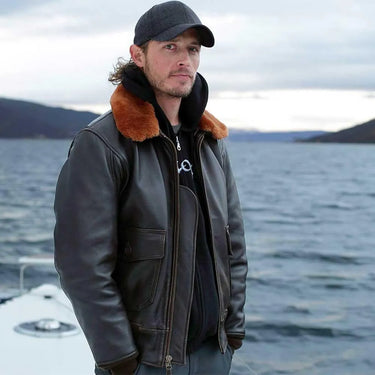 Male model view of a brown Cockpit USA men's G-1 antique lambskin leather flight jacket