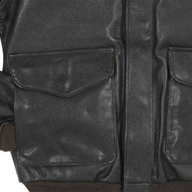 Close-up detail of the front flap pockets and grain texture of the goatskin leather.