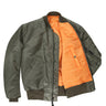 Interior view of Cockpit USA Men's MA-1 Nylon Flight Jacket in olive with bright orange lining