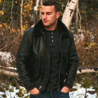 Model wearing Cockpit USA Men's Modified G-1 Leather Flight Jacket outdoors in autumn setting