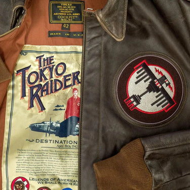 Close-up of "The Tokyo Raiders" lining artwork inside Cockpit USA Men's A-2 flight jacket