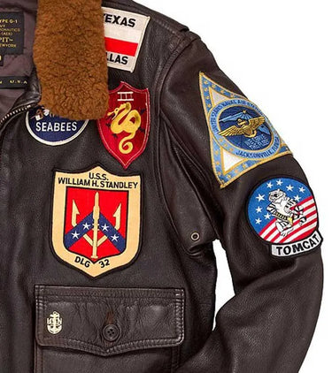 Close-up of shoulder patches and leather detailing on the Cockpit USA Top Gun G-1 Jacket