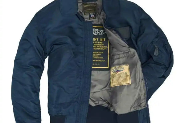 Interior view of Cockpit USA Men's USN Fighter Weapons Nylon Flight Jacket in navy with flight kit label