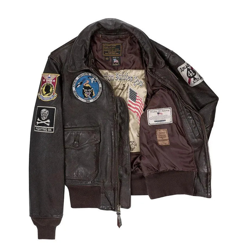 Interior view of Cockpit USA Men's Carrier Pilot Jacket showing embroidered lining with "The Nation Salutes You" and USA flag
