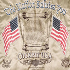 Interior artwork reading "The Nation Salutes You" with American flags and embroidered message.