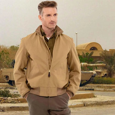 Model wearing Cockpit USA Men's British Khaki WWII Tanker Jacket in military setting