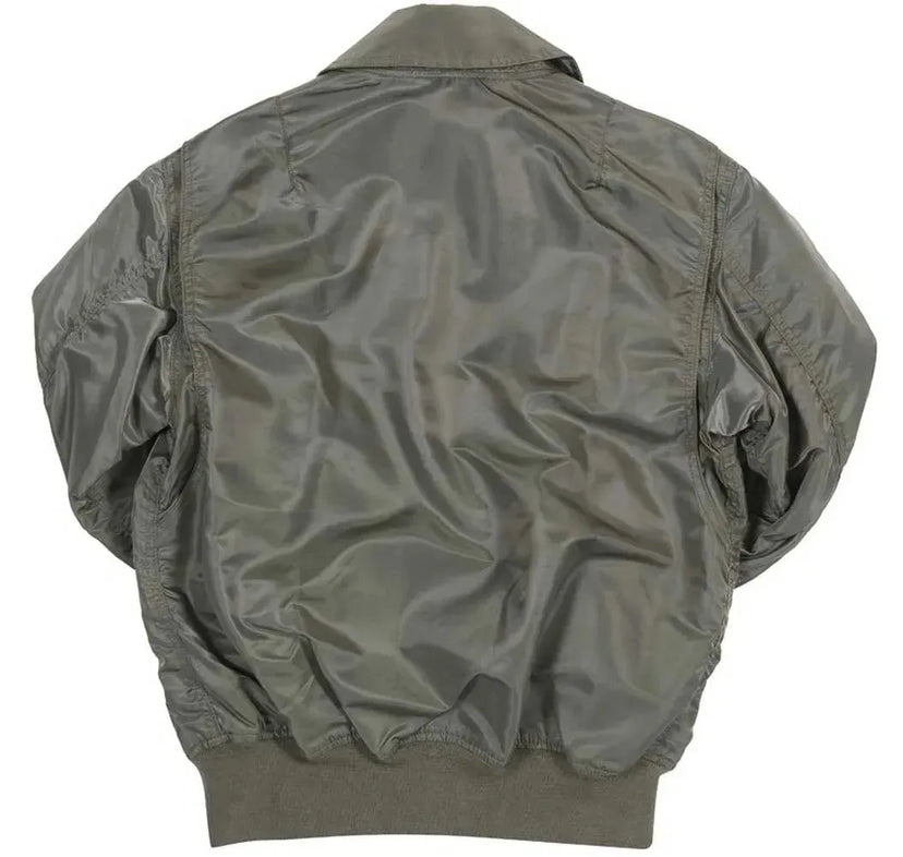 Back view of the jacket highlighting the lightweight nylon construction and rib-knit waistband.