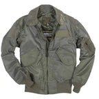 Front view of the sage green nylon USN Fighter Weapons Flight Jacket with flap pockets and sleeve utility pocket.