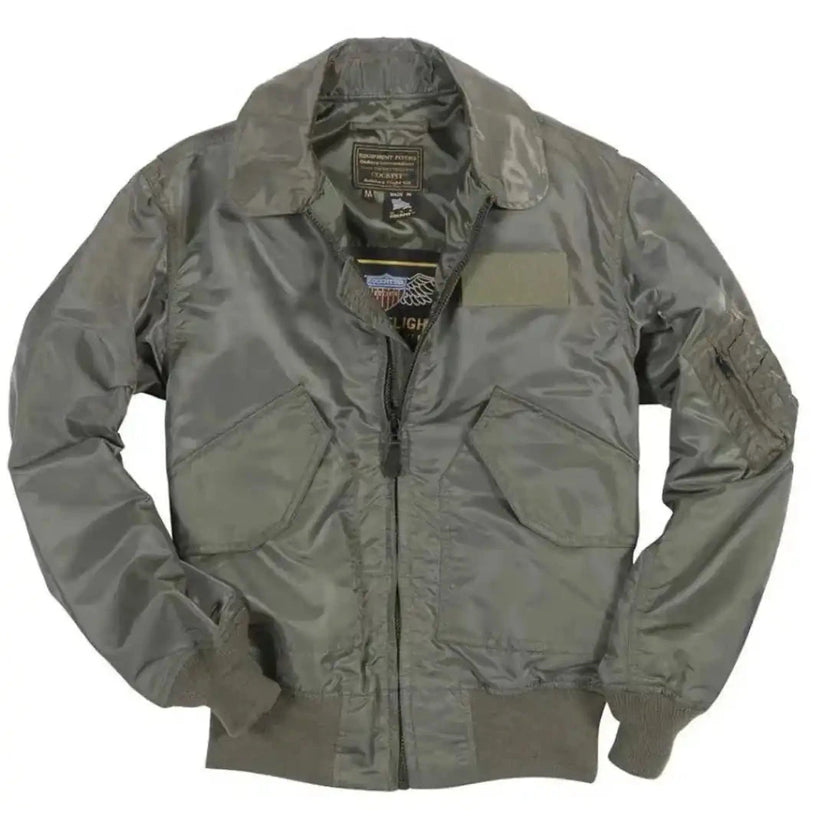 Front view of the sage green nylon USN Fighter Weapons Flight Jacket with flap pockets and sleeve utility pocket.