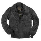 Front view of the Cockpit USA Men's USN Fighter Weapons Nylon Flight Jacket in black with patch-ready Velcro and angled pockets.