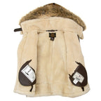 Interior cream shearling lining of the Cockpit USA Women’s Hooded B-3 Bomber Jacket in brown