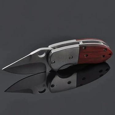 Side view of Fat Boy folding knife with partially open blade, polished metal finish, and rich wood handle