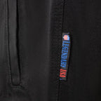 Close-up of Legendary USA Made in USA woven tag on Revolution men’s denim motorcycle vest