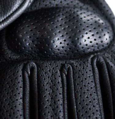 Close-up of perforated knuckle armor on Legendary Uppercut Deerskin motorcycle gloves for added protection, Made in USA