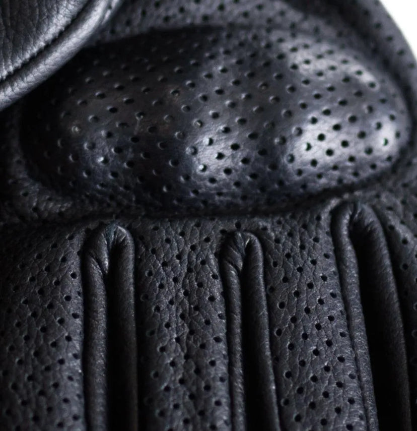 Close-up of perforated knuckle armor on Legendary Uppercut Deerskin motorcycle gloves for added protection, Made in USA